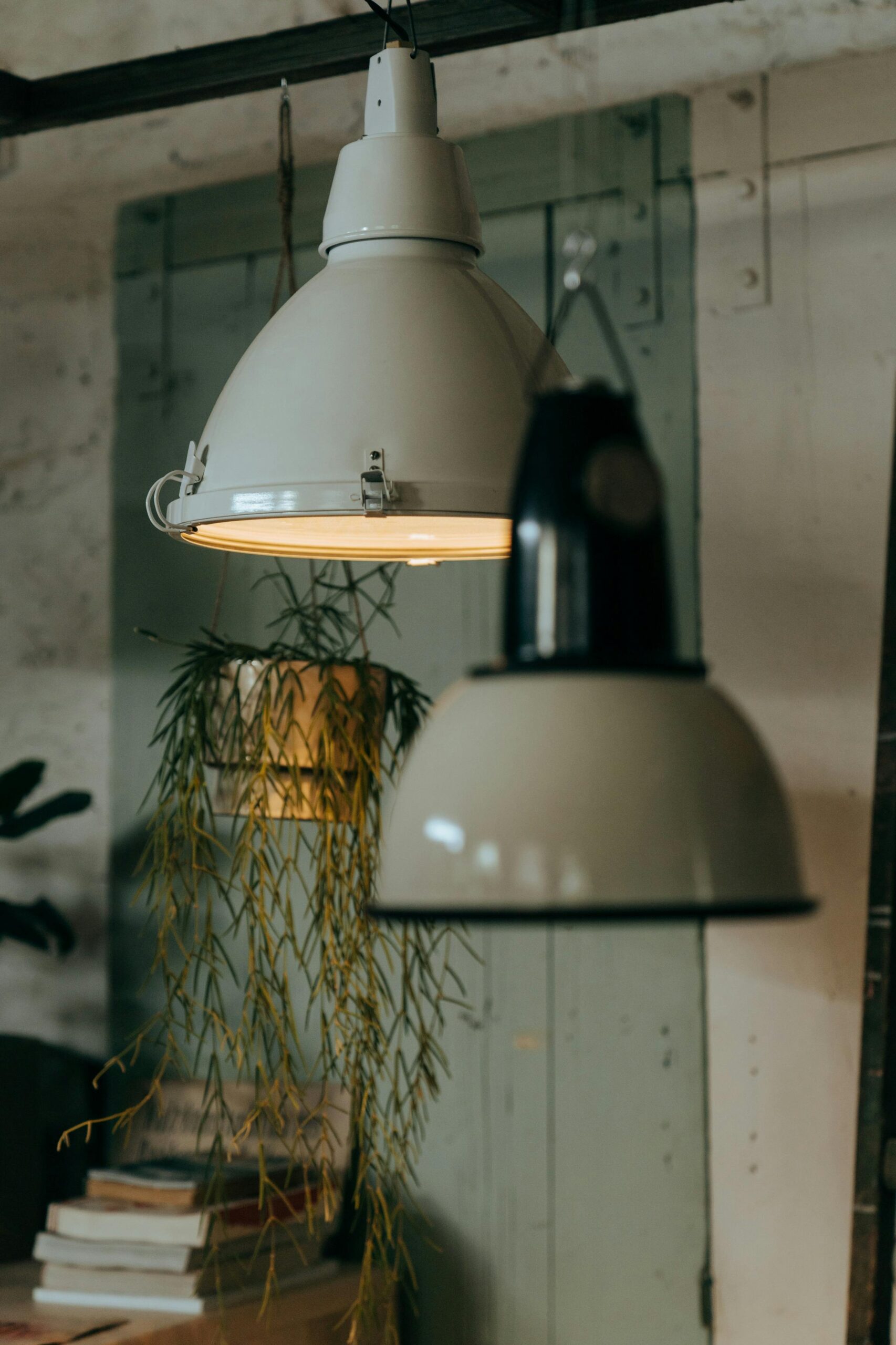 Warm vintage pendant lamps in a cozy rustic interior create an inviting atmosphere.